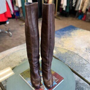 Tall brown leather boots